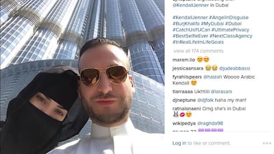 A screenshot of DJ Neptune’s Instagram post showing Kendall Jenner in Dubai in front of the Burj Khalifa.