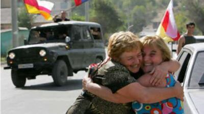 Residents of Tskhinvali celebrate the recognition of South Ossetian independence by the Russian Federation on Aug 26, 2008. Russia formally recognised Georgian rebel regions of South Ossetia and Abkhazia as independent states in a startling new challenge to the West.