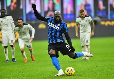 Inter Milan's Romelu Lukaku scores their second goal from the penalty spot against Spezia. Reuters