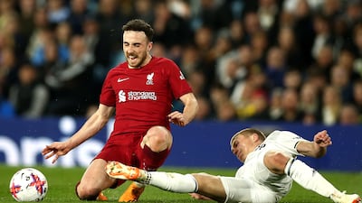 Rasmus Kristensen of Leeds in action against Diogo Jota of Liverpool. EPA
