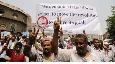 Anti-government protesters march yesterday during a demonstration to demand the resignation of Yemen's president, Ali Abdullah Saleh, in Taiz. Five soldiers were killed and six wounded during an operation in the southern city of Zinjibar. Khaled Abdullah / Reuters