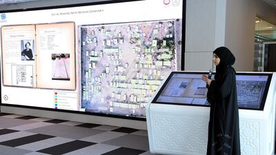 The touchscreen offering details of the residents buried at Sas Al Nakhl Non-Muslim Cemetery is revealed. Courtesy Khalifa University of Science and Technology