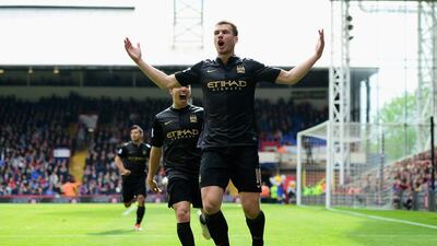 Edin Dzeko gave Manchester City a lead they would never relinquish just four minutes into the match at Crystal Palace, and Yaya Toure added insurance as they keep the pressure on Liverpool for the Premier League title chase. Jamie McDonald / Getty Images