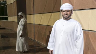 Mohammed Al Saeedi, 35, a student at Ajman University of Science and Technology, supports his college against a ban by Oman’s ministry of higher education. Reem Mohammed / The National