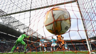 Andy Robertson of Hull City scores an own goal during the Sky Bet Championship Play Off semi final second leg match between Hull City and Derby County at KC Stadium on May 17, 2016 in Derby, England. (Photo by Laurence Griffiths/Getty Images) *** BESTPIX ***