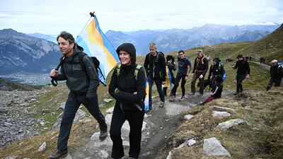 People take part in a ceremony to mark the 'death' of the Pizol glacier (Pizolgletscher) above Mels, eastern Switzerland. AFP
