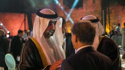 Sheikh Hamed bin Zayed, Chairman of Crown Prince Court - Abu Dhabi and Managing Director of the Abu Dhabi Investment Authority, left, speaks with a guest during the 10th anniversary of the Lalla Salma Foundation - Prevention and Treatment of Cancers, in Marrakech, Morocco. Rashed Al Mansoori / Crown Prince Court - Abu Dhabi