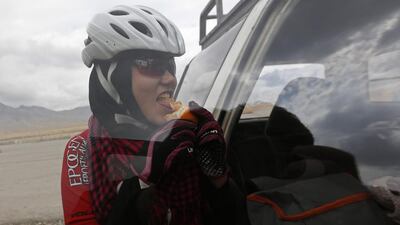 Masooma Alizada, a member of Afghanistan’s Women’s National Cycling Team eats an orange after training. Mohammad Ismail / Reuters