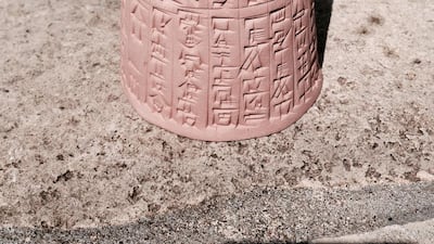 Jeremiah Peterson makes painstaking incisions on clay tablets, writing messages in Sumerian, the world’s oldest known language.