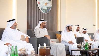 Sheikh Mohamed bin Zayed, Crown Prince of Abu Dhabi and Deputy Supreme Commander of the Armed Forces (2nd L), visits the home of Dr Omar Habtoor Al Derei, Director General of the UAE Fatwa Council (3rd L). Seen with Hamad Habtoor Al Derei (L) and Sheikh Mohammed bin Hamad bin Tahnoon, adviser for Special Affairs at the Ministry of Presidential Affairs (4th L) and other dignitaries.