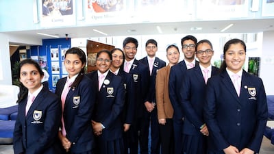 Nargish Khambatta, in brown jacket, the principal at Gems Modern Academy with Grade 12 students Anvi Bahl (from left) Priyanjali Guha, Shruti Manglik, Pooja Balaji, Isaac Joy, Sarthak Kumar, Devashish Diddi, Poojitha Janarthanan and Shivangi of Gem students who have returned from a trip to Antartica. Ravindranath K / The National