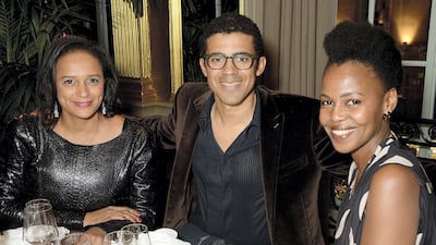 Isabel dos Santos, Sindika Dokolo and Wangechi Mutu attend the Sindika Dokolo Art Foundation dinner at Cafe Royal, London, in October 2018. Getty