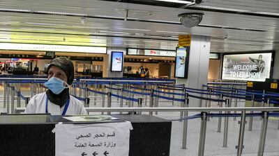 A member of medical team waits at an empty arrival terminal at the Rafik Hariri International Airport in Beirut, Lebanon, 09 March 2020. EPA