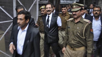 Sahara group chairman Subrata Roy is escorted by police to a court in the northern Indian city of Lucknow. Reuters