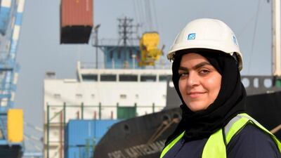 Ayesha Al Marzooqi operates a 126-metre crane moving containers from large ships to shore and found out about the job during an open day event last year to recruit UAE nationals. Courtesy Tawdheef