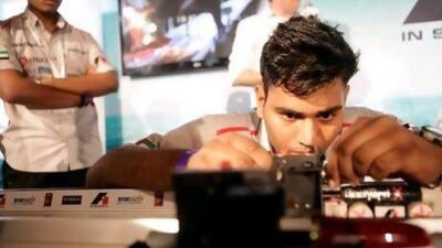 BlackBird X’s Sreekanth Mohankumar applies the finishing touches during the F1 in School world finals.