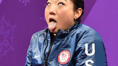 Mirai Nagasu of the US reacts after her performance in the women's single skating short programme. Mladen Antonov / AFP Photo