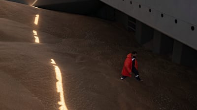 A crew member prepares a grain analysis as part of a UN inspection. AFP