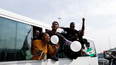 Demonstrators mark the first anniversary of the EndSARS protest in October 2020, which resulted in 10 protesters being shot dead at a tolling booth complex in the capital Lagos. Reuters
