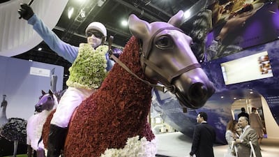 Guests look at the Dubai Properties showroom. Jaime Puebla / The National