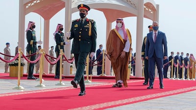 Saudi Crown Prince Mohammed bin Salman, center right, accompanies Iraqi Prime Minister Mustafa Al Kadhimi on the red carpet on his arrival to Riyadh International Airport, in Saudi Arabia. Riyadh committed to a $3bn fund for development of critical projects in Iraq. AP