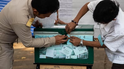 A ballot box is sealed after voting closed on Sunday. Getty