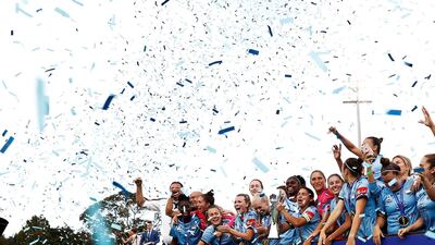 Sydney FC celebrate with the winners trophy during the W-League Grand Final match in Sydney, Australia. Getty Images
