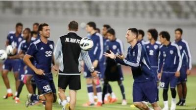Matei Mirel Radoi, front right, and the rest of Al Ain team on the training pitch. Little can prepare them for the 100,000 hostile Iranian fans that will pack Esteghlal's Azadi Stadium in Tehran.