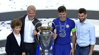 Chelsea owner Roman Abramovich with club captain Cesar Azpilicueta after the 2021 Champions League final in Porto. PA