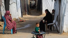 A Palestinian child at the Nuseirat refugee camp, in central Gaza. AFP