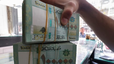 Lebanese pound banknotes in Beirut. The currency has plummeted to a fraction of what it was once worth. Reuters