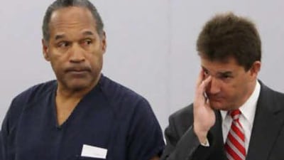 OJ Simpson is sentenced in a Las Vegas courtroom yesterday on charges of conspiracy, kidnapping, robbery and using a deadly weapon.