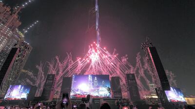 Fireworks go off at the one year to go Expo 2020 Dubai celebrations at Burj Park.
