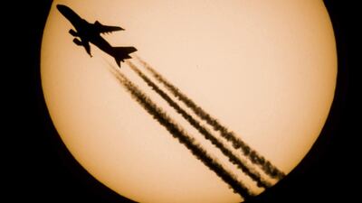 An Singapore Airlines passenger jet of Singapore Airlines is silhouetted against the Sun on October 28, 2016, in Salgotarjan, 109 kilometres north-east of Budapest, Hungary. Peter Komka / EPA
