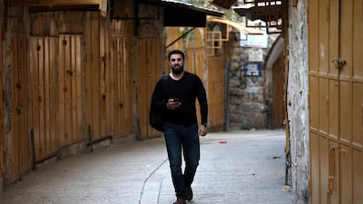 A view of empty street and closed shops in Hebron. EPA
