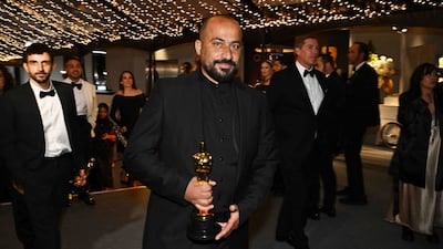 Palestinian filmmaker Hamdan Ballal with his Oscar for Best Documentary Feature for No Other Land. AFP