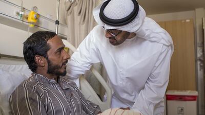 Sheikh Mohammed with a serviceman. The Abu Dhabi Crown Prince has visited injured soldiers at Mafraq Hospital and Zayed Military Hospital in the capital.
