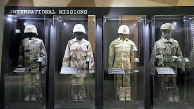 Left to right – Kosovo peacekeeping mission uniform, Restore Hope in Somalia mission uniform , Liberation of Kuwait operation uniform and Lebanon Peacekeeping mission uniform on display at the UAE Armed Forces Exhibition held at Etihad Museum in Dubai. Pawan Singh / The National