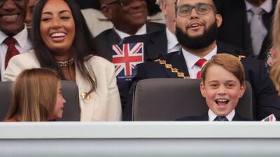 Princess Charlotte and Prince George, right, enjoying the Platinum Party at the Palace. Reuters