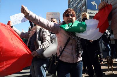 Street traders protest in Milan, Italy, demanding to be allowed to operate amid Europe's third Covid-19 wave. EPA