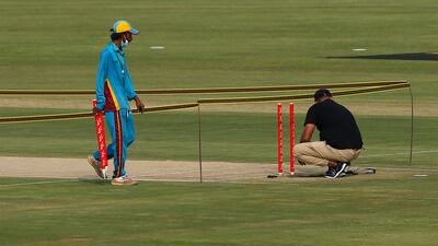 Ground staff remove wickets at the Rawalpindi Cricket Stadium after New Zealand pulled out of the Pakistan tour on Friday. AP