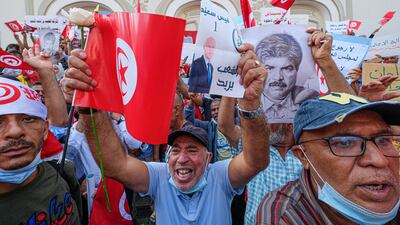 Thousands rallied on the steps of the National Theatre on Sunday in support of President Kais Saied. Noureddine Ahmed / The National