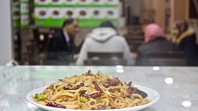 Hui cuisine is particularly famous for dishes that use laghman, hand-pulled noodles. Miriam Berger
