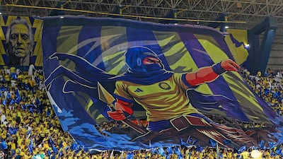 Al Nassr fans display a banner at King Fahd Sports City Stadium in Riyadh. AFP