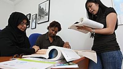 Janice Loria takes students at the Gulf Travel Training Centre in Abu Dhabi through a lesson. Hospitality industries have been hard hit in the financial crisis, turning the search for work into "war", according to a hotel executive.