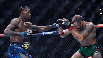 Jul 29, 2023; Salt Lake City, Utah, USA; Michael Chiesa, right, fights Kevin Holland. Reuters