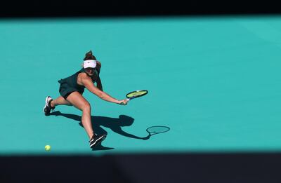 Marta Kostyuk in action against Su-Wei Hsieh at the Abu Dhabi WTA Women's Tennis Open. Getty Images