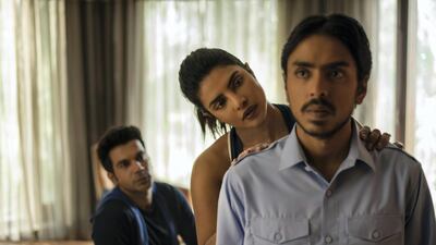 Rajkummar Rao as Ashok, Priyanka Chopra as Pinky Madam, and Adarsh Gourav as Balram in 'The White Tiger'. Netflix