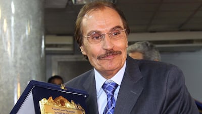 Egyptian actor Ezzat Al Alaili poses for photographers with his award during an honouring held for the actors who participated in making films about the 6th of October war, in Cairo, Egypt, October 18, 2009. EPA