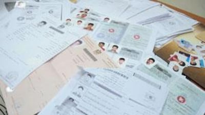 Visas confiscated by police in Ras al Khaimah.